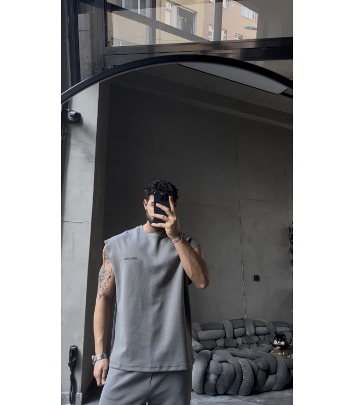 YENİ SEZON YIKAMA KUMAŞ ARKA BASKI DETAYLI OVERSİZE SIFIR KOL TSHİRT