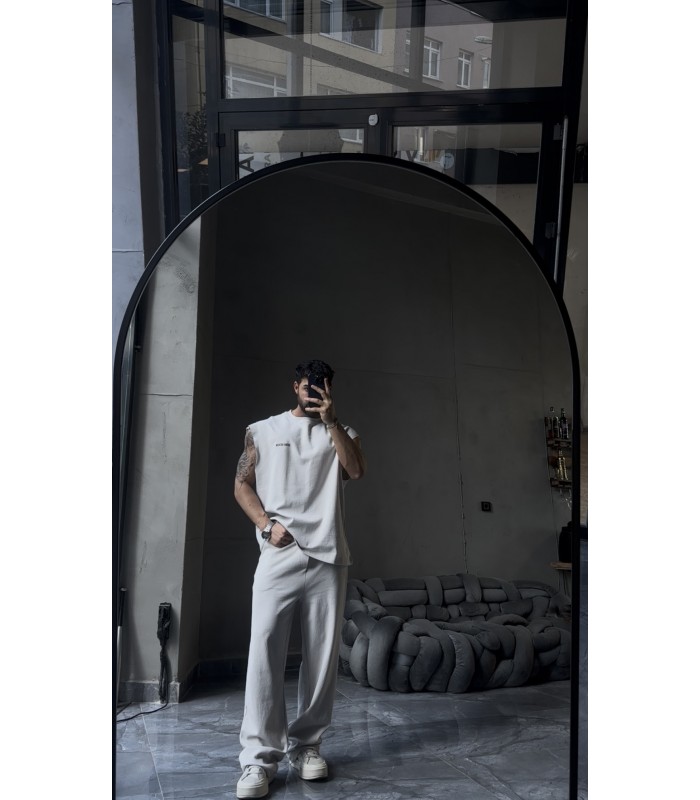 YENİ SEZON YIKAMA KUMAŞ ARKA BASKI DETAYLI OVERSİZE SIFIR KOL TSHİRT