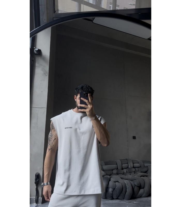 YENİ SEZON YIKAMA KUMAŞ ARKA BASKI DETAYLI OVERSİZE SIFIR KOL TSHİRT