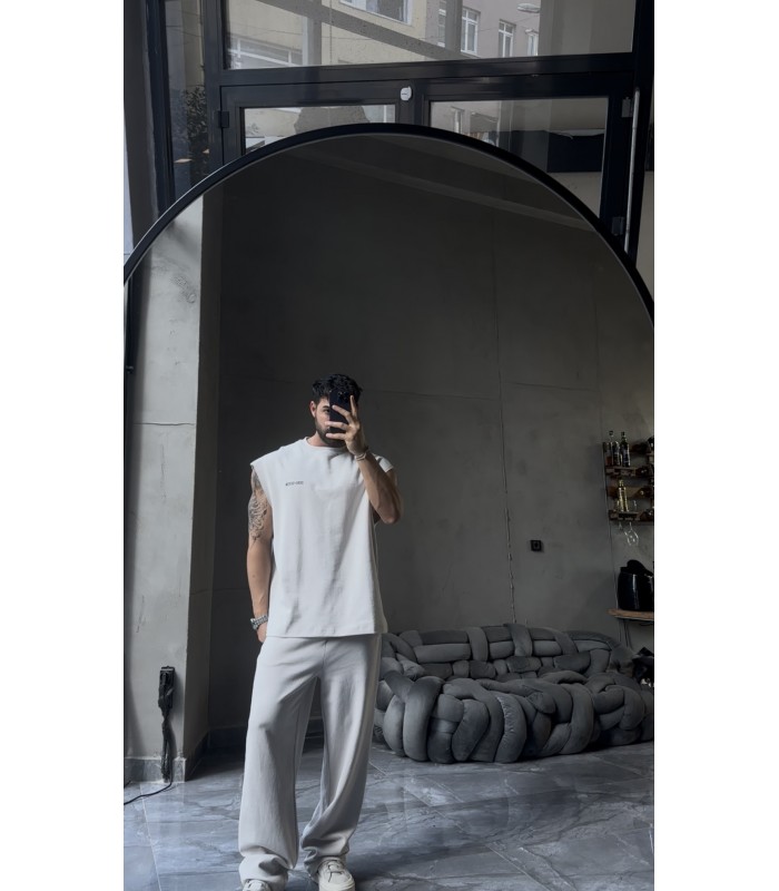 YENİ SEZON YIKAMA KUMAŞ ARKA BASKI DETAYLI OVERSİZE SIFIR KOL TSHİRT