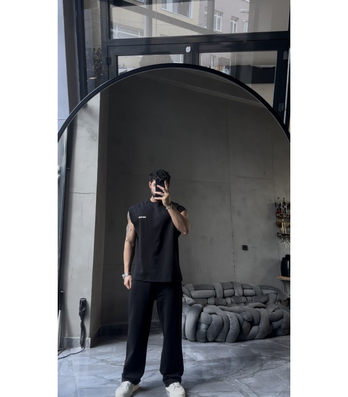 YENİ SEZON YIKAMA KUMAŞ ARKA BASKI DETAYLI OVERSİZE SIFIR KOL TSHİRT