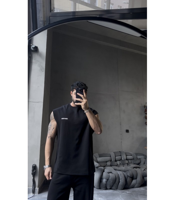 YENİ SEZON YIKAMA KUMAŞ ARKA BASKI DETAYLI OVERSİZE SIFIR KOL TSHİRT